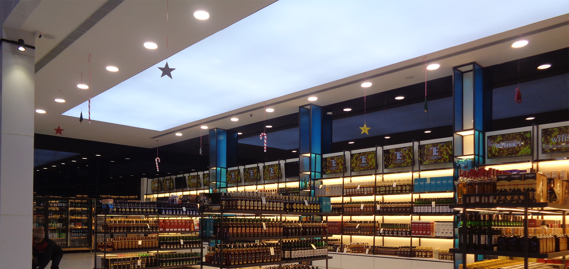 Fabric-tensioned ceiling with concealed LED lightbox at The Liquor Fort, Maidawas Gurgaon